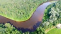 Overhead view of river across the forest Royalty Free Stock Photo