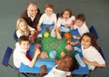 Overhead View Of Schoolchildren Working Together