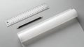 Architectural Drafting Tools with Blank Paper Roll on Grey Background Royalty Free Stock Photo