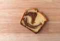 Overhead view of a slice of a freshly baked cinnamon marble pound cake