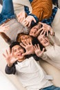 overhead view of smiling multiethnic teens