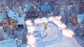 Snowbound town at Christmas winter night top view