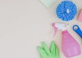 overhead view spray bottle green gloves sponge white backdrop. High quality photo