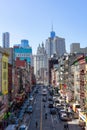 Overhead view of a Street in Two Bridges of New York City with the Lower Manhattan Skyline in the distance