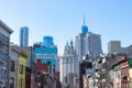 Overhead view of a Street in Two Bridges of New York City with the Lower Manhattan Skyline in the distance