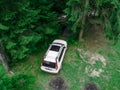overhead view of the suv car in forest camping site Royalty Free Stock Photo