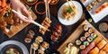 Overhead view of a table full of traditional Japanese food dishes