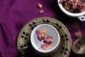 Overhead view of a tea cup of Rose tea with rose petals Royalty Free Stock Photo