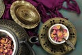 Overhead view of a tea cup of Rose tea with rose petals Royalty Free Stock Photo