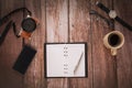 Overhead view of Traveler`s accessories on wooden table background Royalty Free Stock Photo