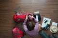 Overhead view of traveler woman plan and backpack planning Royalty Free Stock Photo