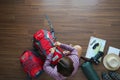 Overhead view of traveler woman plan and backpack planning Royalty Free Stock Photo