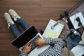 Overhead view of traveler woman working laptop computer Royalty Free Stock Photo