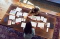 Overhead View Of Two Women Having Creative Design Meeting Around Wooden Table In Office Royalty Free Stock Photo