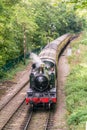 Overhead view of 4160 vintage steam locomotive moving towards camera