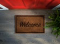 Overhead view of welcome mat outside inviting front door Royalty Free Stock Photo