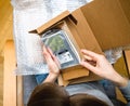 OVerhead view of woman hand unboxing unpacking Western Digital
