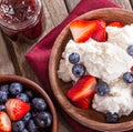 Bowl of Vanilla Ice Cream With Blueberries and Strawberries Royalty Free Stock Photo