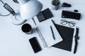 overhead view of working table with smartphone Royalty Free Stock Photo