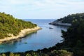 An overhead view of Zitna Beach during a beautiful evening close to sundown, on a wonderfully spectacular bay on Korcula Island