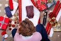 Overhead woman wrapping her Christmas presents. Royalty Free Stock Photo