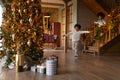 Overjoyed African American kids running downstairs on Christmas morning