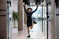 Overjoyed African American woman worker dance in office Royalty Free Stock Photo