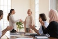 Smiling businesswoman handshake middle-aged employee greeting with employment