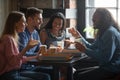 Overjoyed diverse company of students relaxing in pizza place