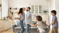 Overjoyed family with little kids have fun dancing Royalty Free Stock Photo