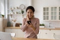 Excited woman triumph with good news on cellphone Royalty Free Stock Photo