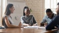 Overjoyed mixed race employees managers workers laughing at funny joke. Royalty Free Stock Photo