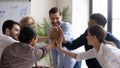 Overjoyed businesspeople involved in teambuilding activity at meeting Royalty Free Stock Photo