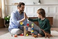Happy dad and little son give high five playing Royalty Free Stock Photo