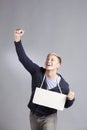 Overjoyed successful man presenting blank signboard.