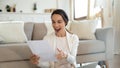 Overjoyed teen girl college student reading document of getting scholarship Royalty Free Stock Photo