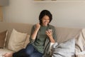 Overjoyed woman triumph reading good news on cellphone Royalty Free Stock Photo