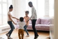 Happy african American family with kids dance together at home Royalty Free Stock Photo