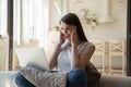 Overjoyed young woman looking at laptop screen, reading good news Royalty Free Stock Photo