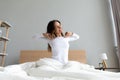 Overjoyed young woman wake up happy at home Royalty Free Stock Photo