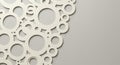 Overlapping circular cut-outs form an intricate pattern on a beige background. The Royalty Free Stock Photo