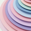 Overlapping circular layers in pastel colors, including pink, blue, and lavender, create a Royalty Free Stock Photo