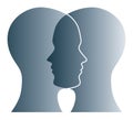 Overlapping gray silhouettes of two heads over white Royalty Free Stock Photo