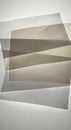 Overlapping translucent sheets of paper are arranged at various angles, creating a Royalty Free Stock Photo