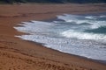 OVERLAPPING WAVES PUSHING OVER THE BEACH Royalty Free Stock Photo