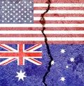 Overlay of the American and Australian flags on a weathered cracked wall background.