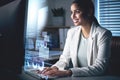 Overlay, night and computer with business woman in office for research, software and programmer. Digital, analytics and Royalty Free Stock Photo