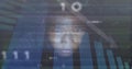 Overlaying adult male face over high-tech data interface, with bar charts, arrow, binary streams Royalty Free Stock Photo