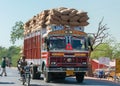 Overloaded dump truck.