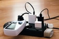 Overloaded power adaptor multiple socket. Surge Protector Power Strip, Phone Charger Cable. Plugs in Outlet Royalty Free Stock Photo